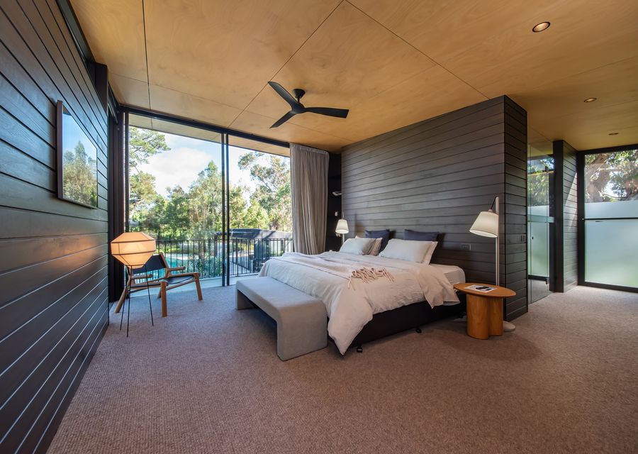 Master bedroom with ensuite and pool views
