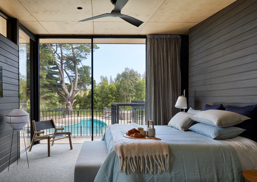 Master bedroom with stunning ensuite and pool views