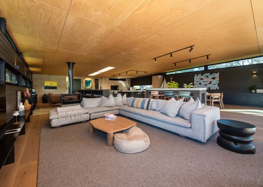 Light and bright living spaces with wood fireplacve, balcony access with BBQ