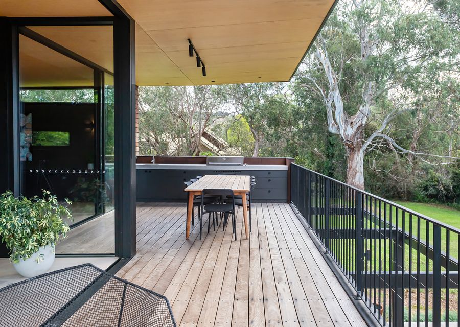 BBQ and outdoor seating area