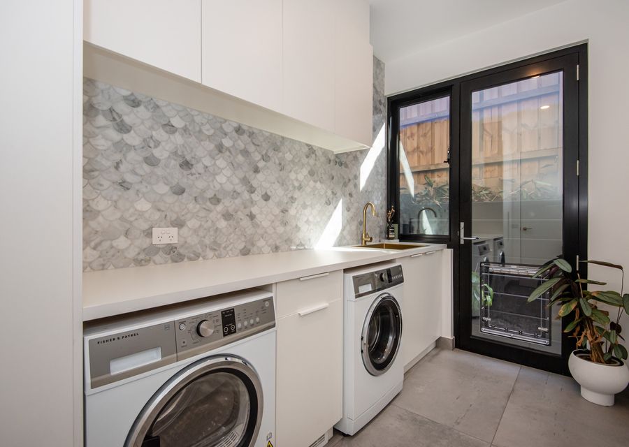Laundry with doggie door 