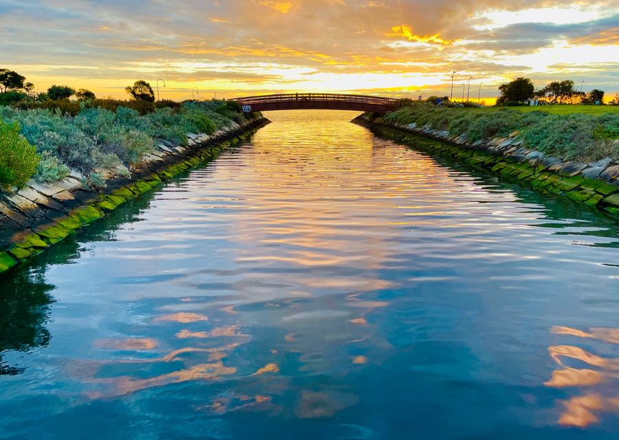 Irresistibly view of the river and sunset - just a few walks away from the property