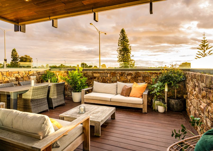 A spacious seating and dining area outside