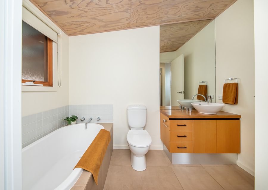 Bathroom with bath and shower 