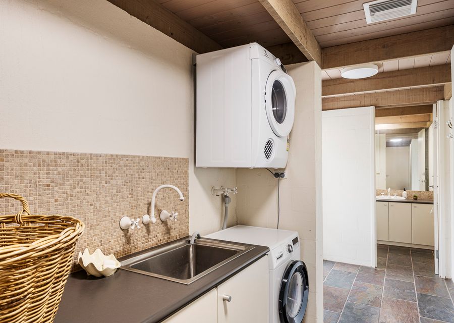 Laundry area with washer and dryer free to use 