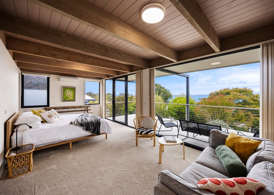 Spacious bedroom with bay views