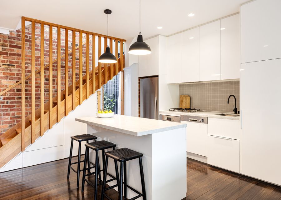 Kitchen with breakfast bar and seating for 3