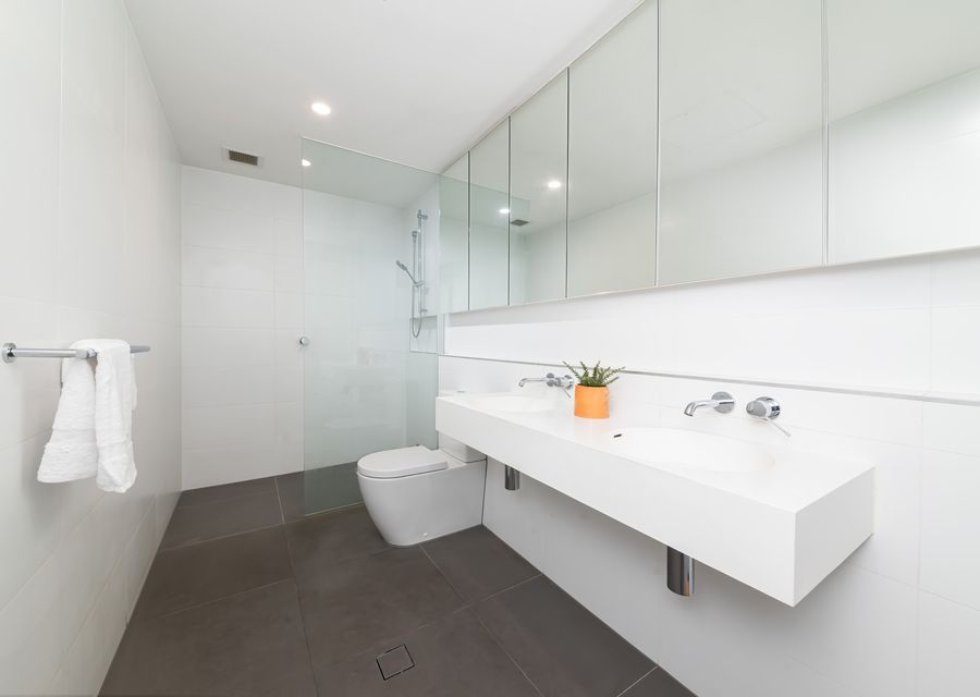 Large bathroom with shower and toilet 