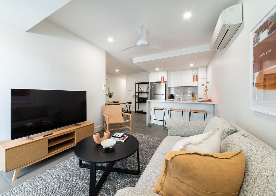 Living area with smart tv, air conditioning.  It's such a gorgeous space 