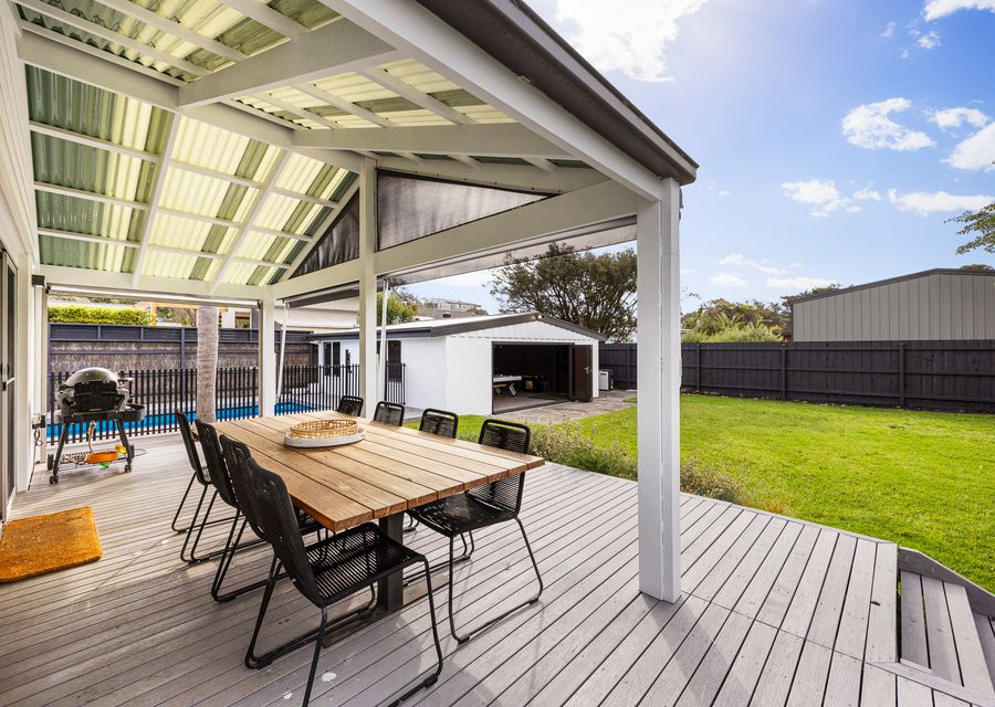 Backyard/deck where you can enjoy BBQ and dinners 