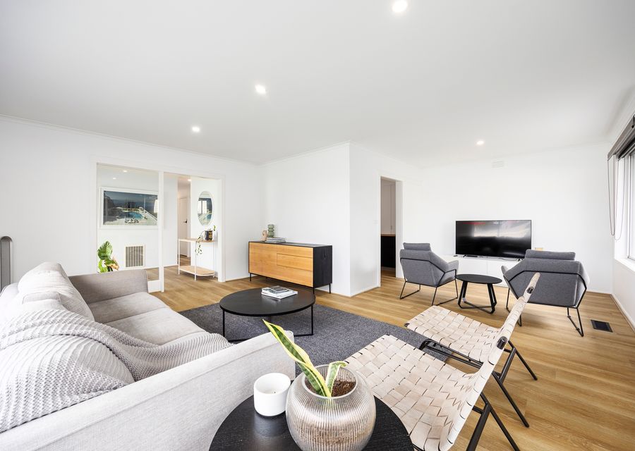 Living room and sitting area with smart TV
