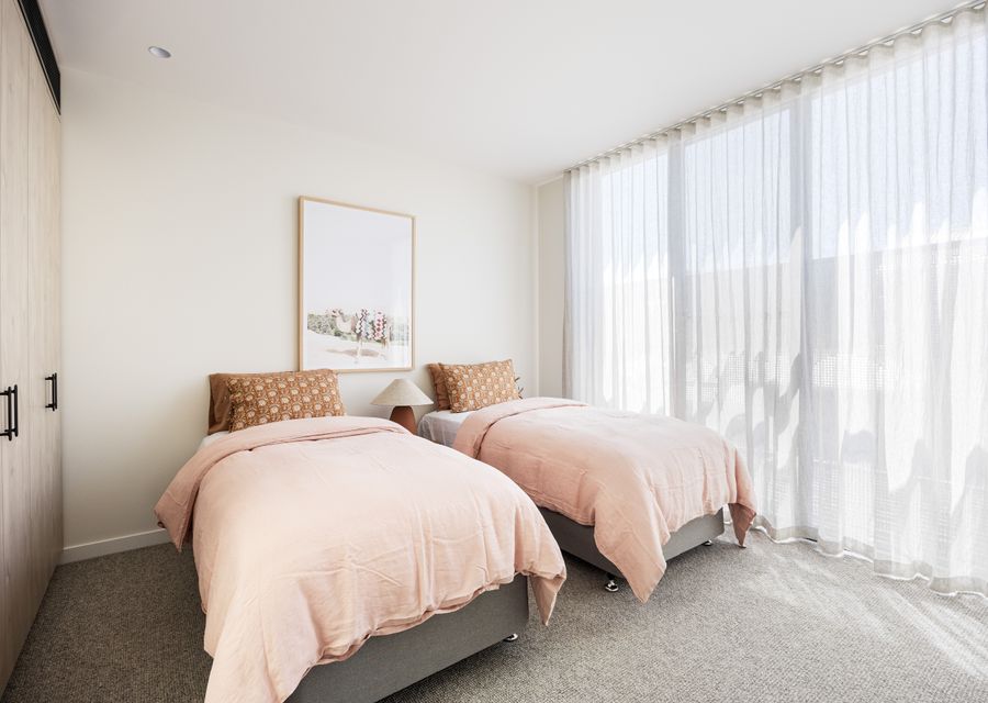 Bedroom two with single beds or queen beds 