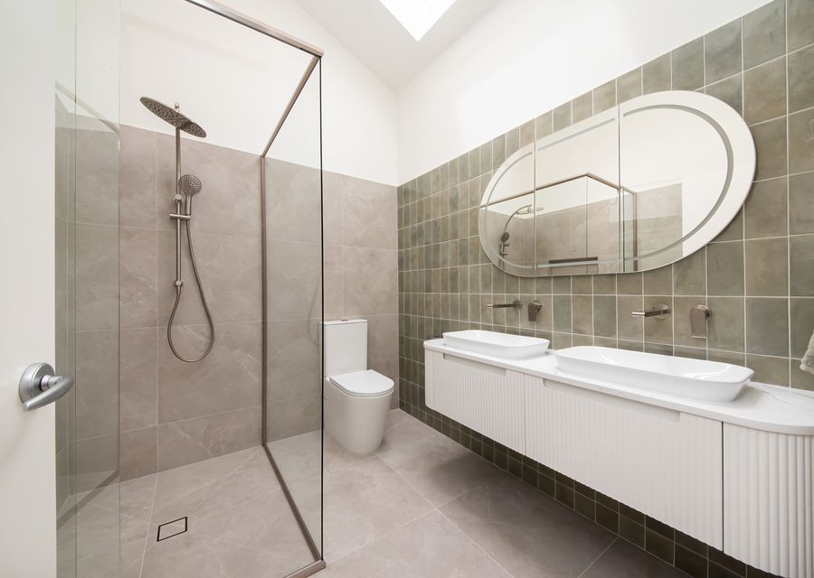 Downstairs bathroom, double vanity and walk in shower