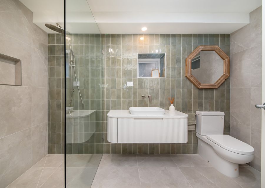 upstairs bathroom with walk in shower