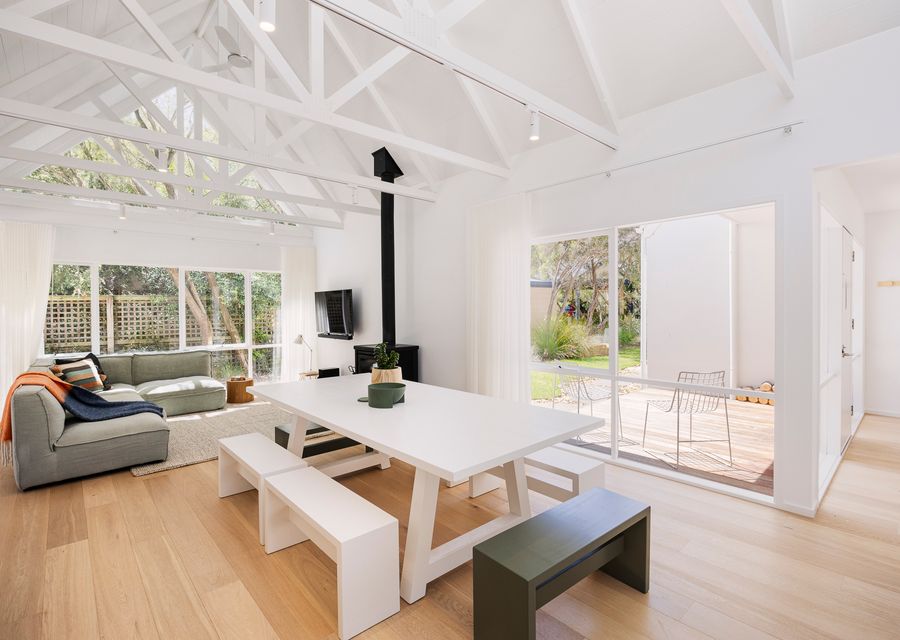 Dining area and living area with the smart TV and fireplace