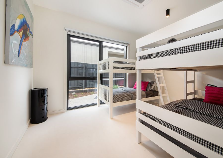 Bedroom 4 features two bunk beds, perfect for children