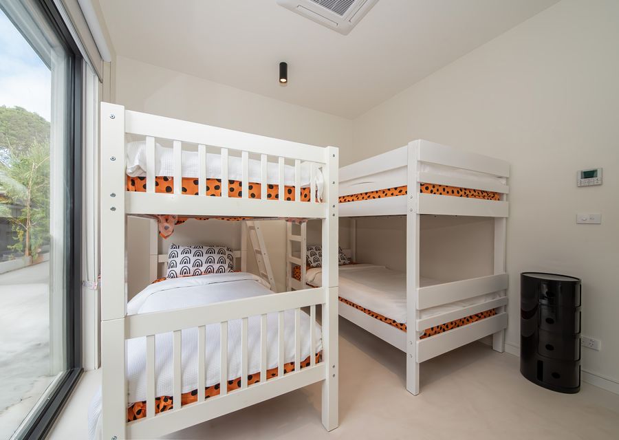 Bedroom 4 features two bunk beds 
