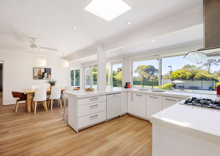 Spacious kitchen with adjacent dining area