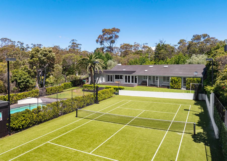 Stunning tennis court, solar heated pool and secure yard 
