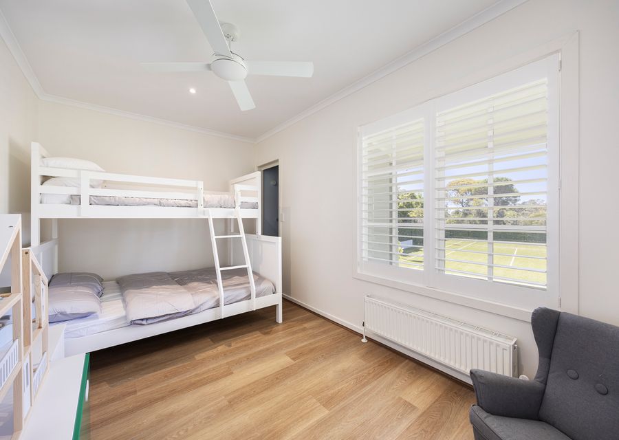 Bedroom four with double bunk and single above 