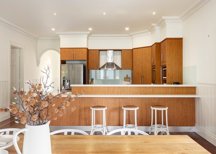 Well-equipped kitchen adjacent to dining area 
