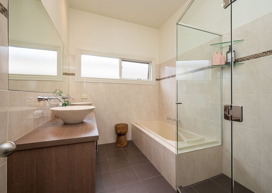 Family bathroom with bath and shower