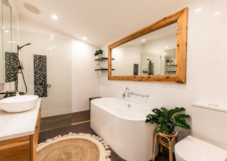 Bathroom with bath and shower 