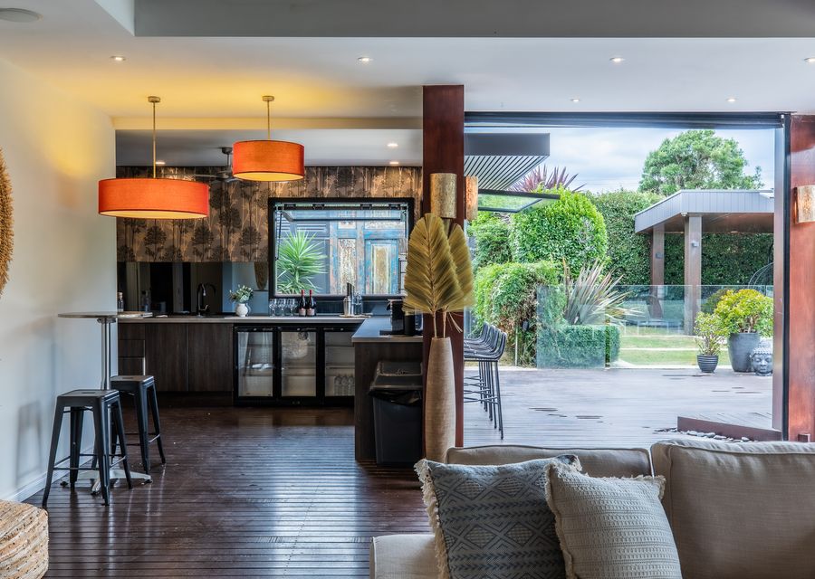 Kitchen and a view of the back deck 