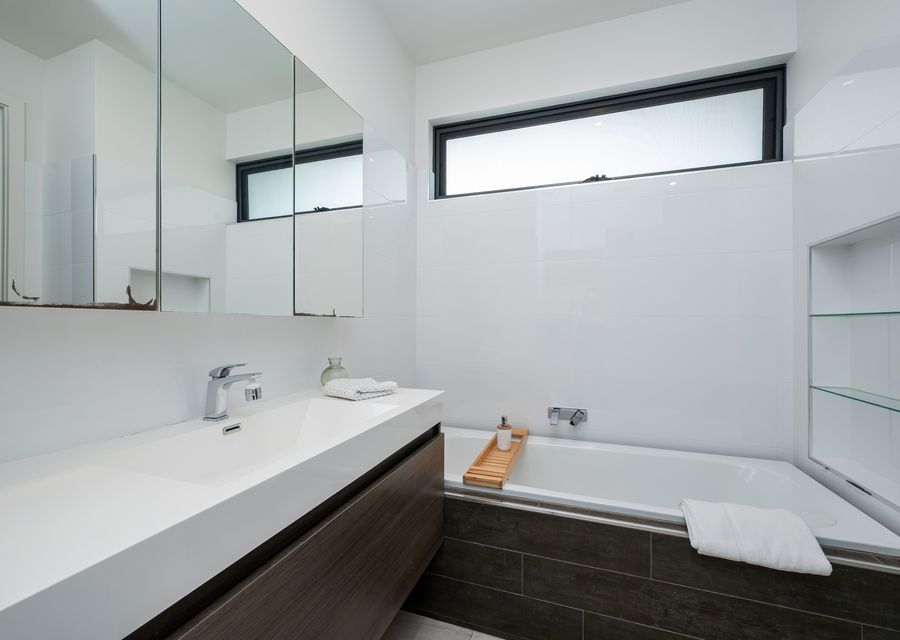 Bathroom with bath and shower