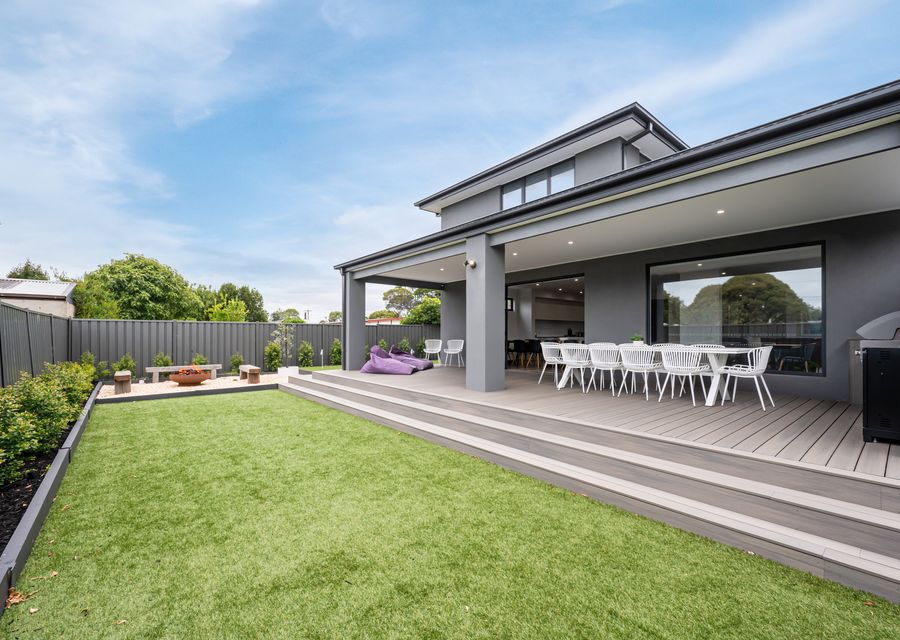 Back deck, spacious, and plenty of area for kids to play and run 