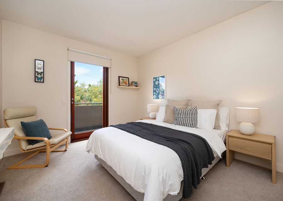 Bedroom 2 with Queen bed and balcony access