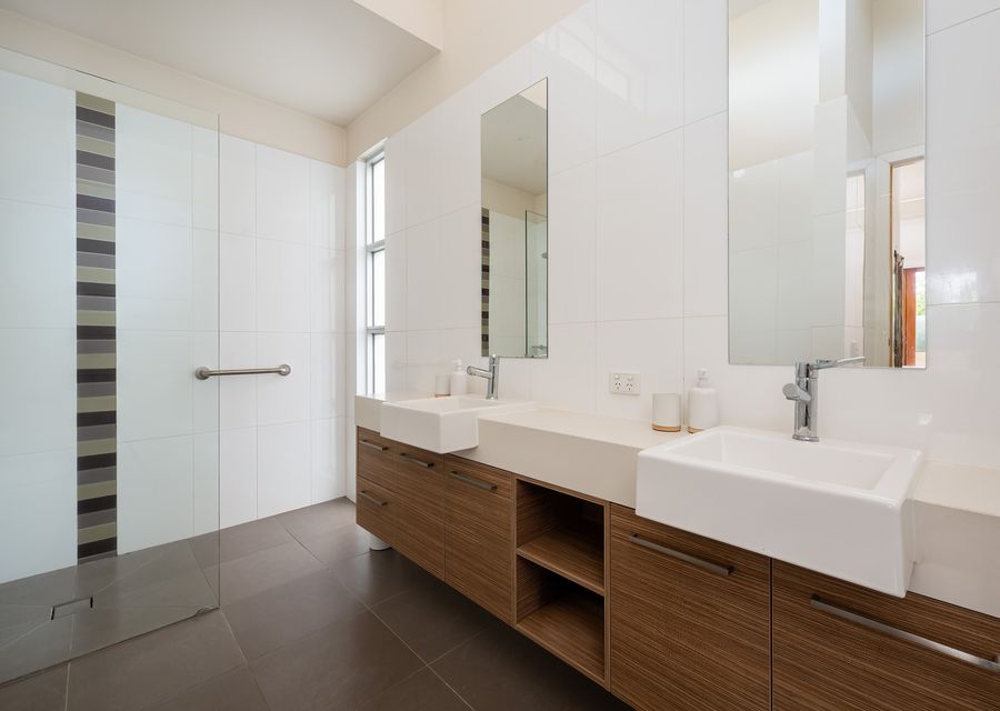 Master ensuite with walk in shower, double vanity and toilet