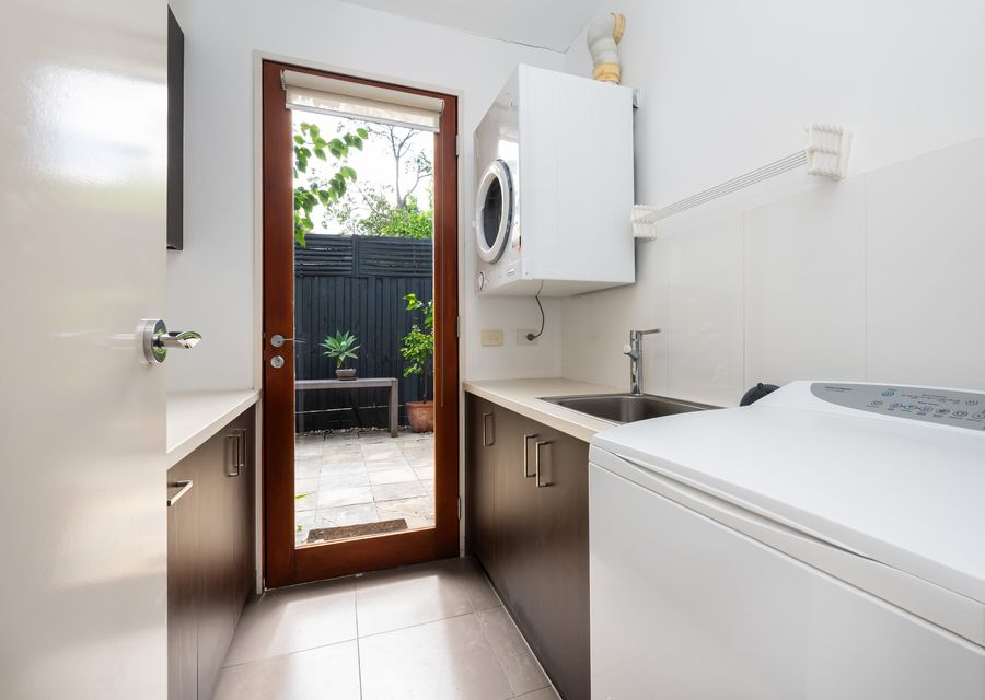 Fully equipped laundry with separate washer and dryer