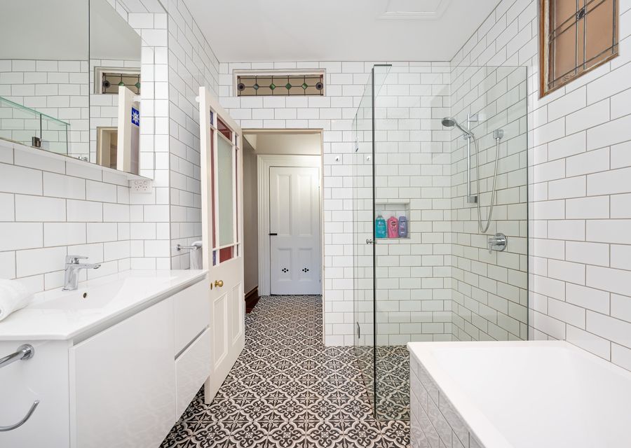 Family bathroomwith walk in shower and bath tub