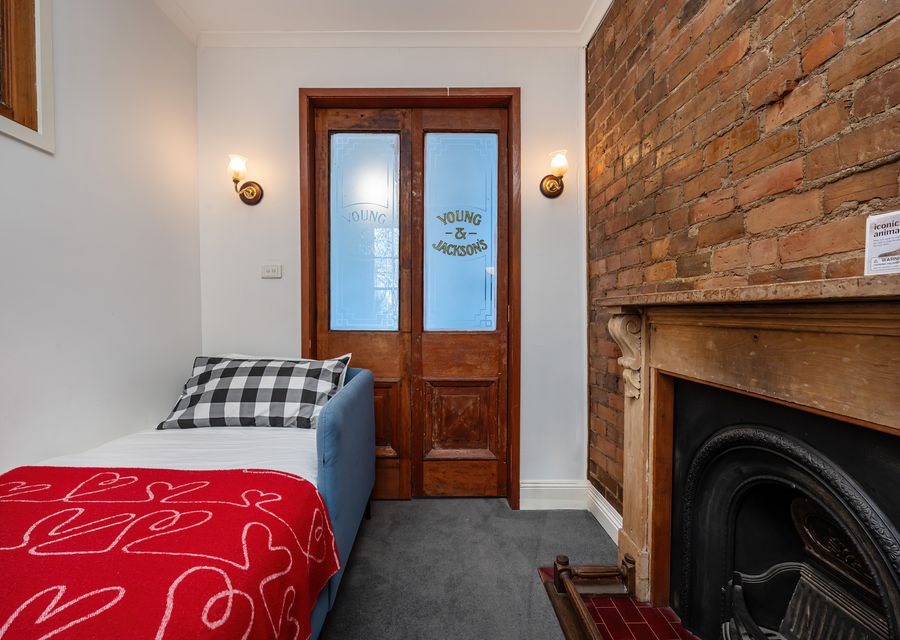2nd single bed in bedroom 3 with ornamental fire place