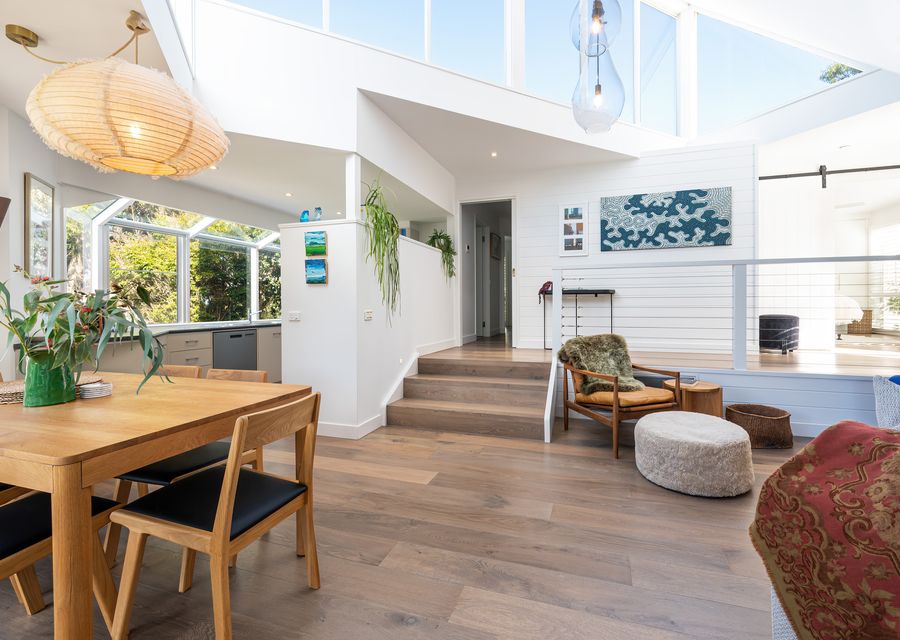 Downstairs, showcasing dining and lounge area 