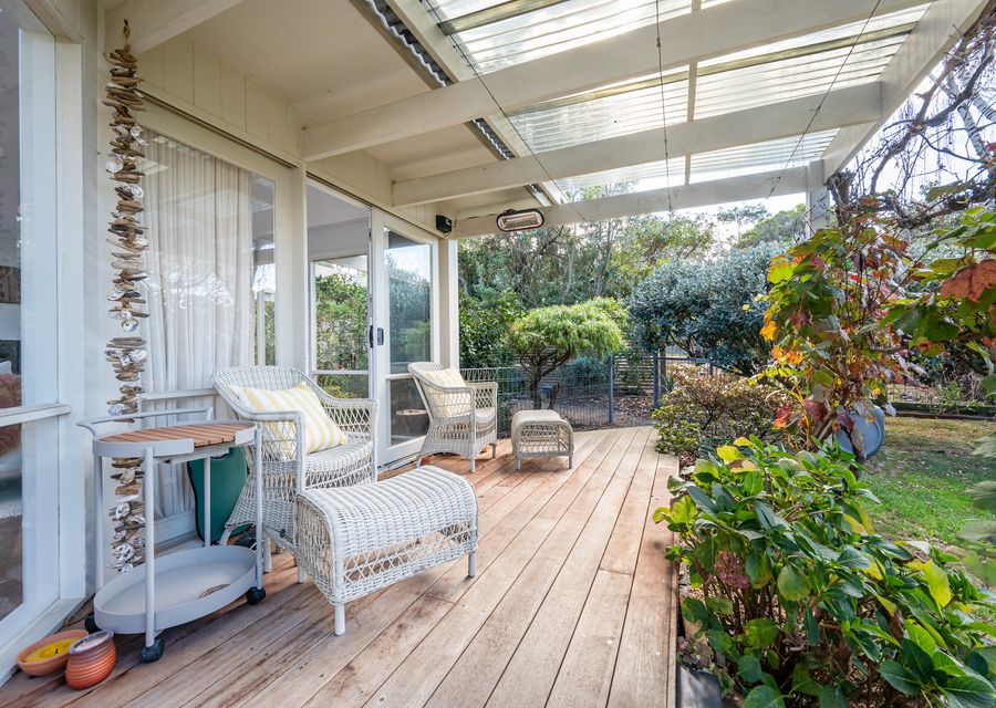 Outdoor seating area with garden view 
