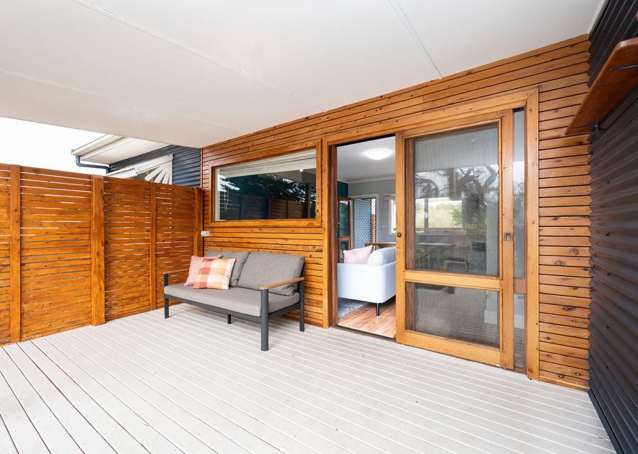 Property entrance with seating area outside 
