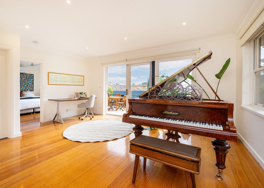 Dedicated desk area and piano