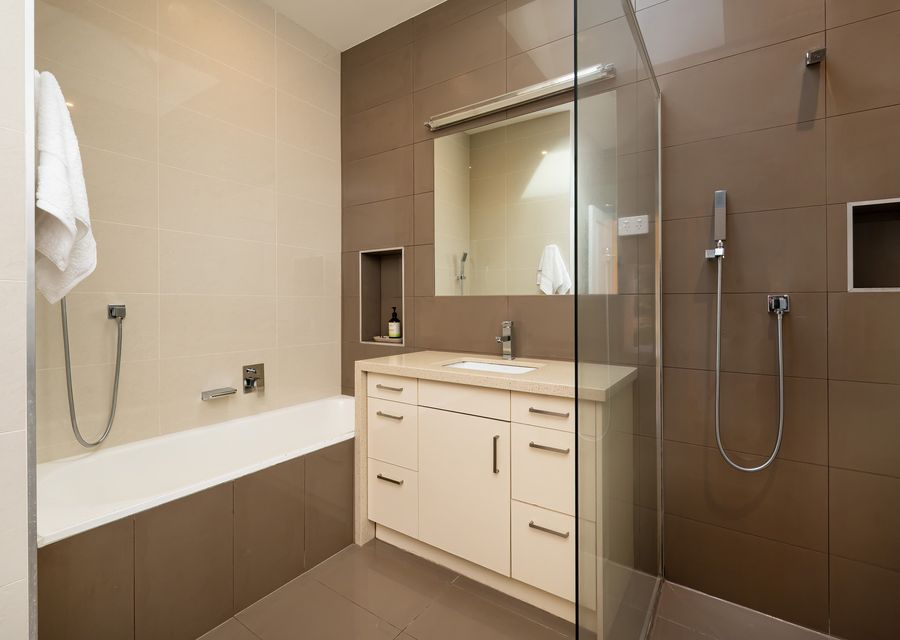 Bathroom one with bath and shower