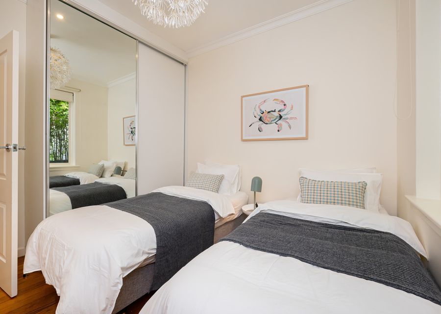 Bedroom three with two single beds