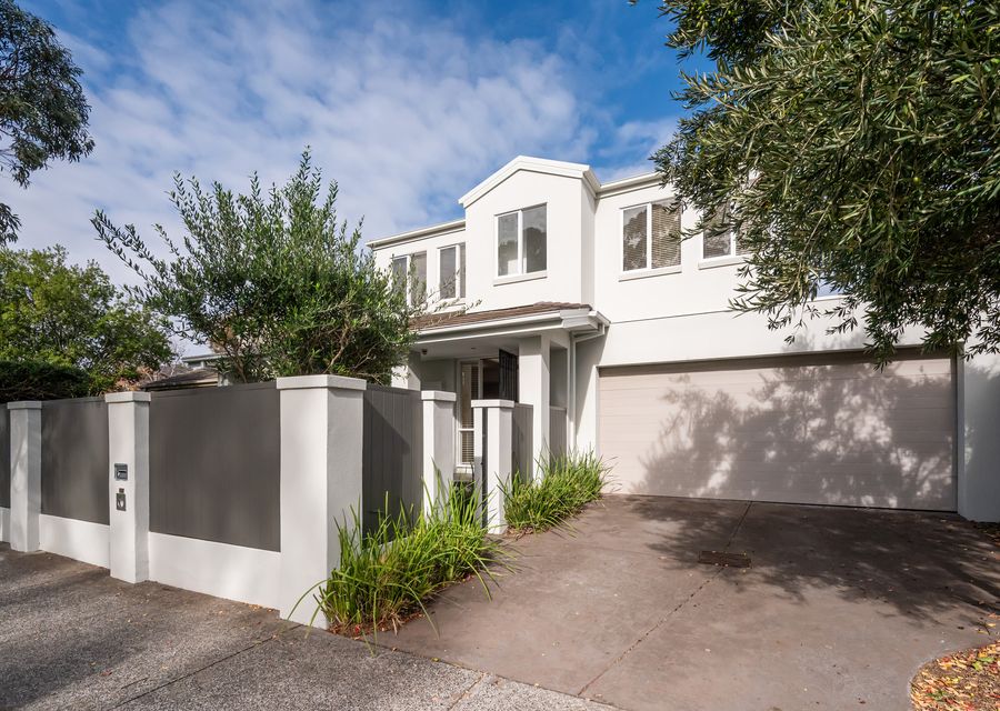 Stunning modern facade with double garage and secure front courtyard