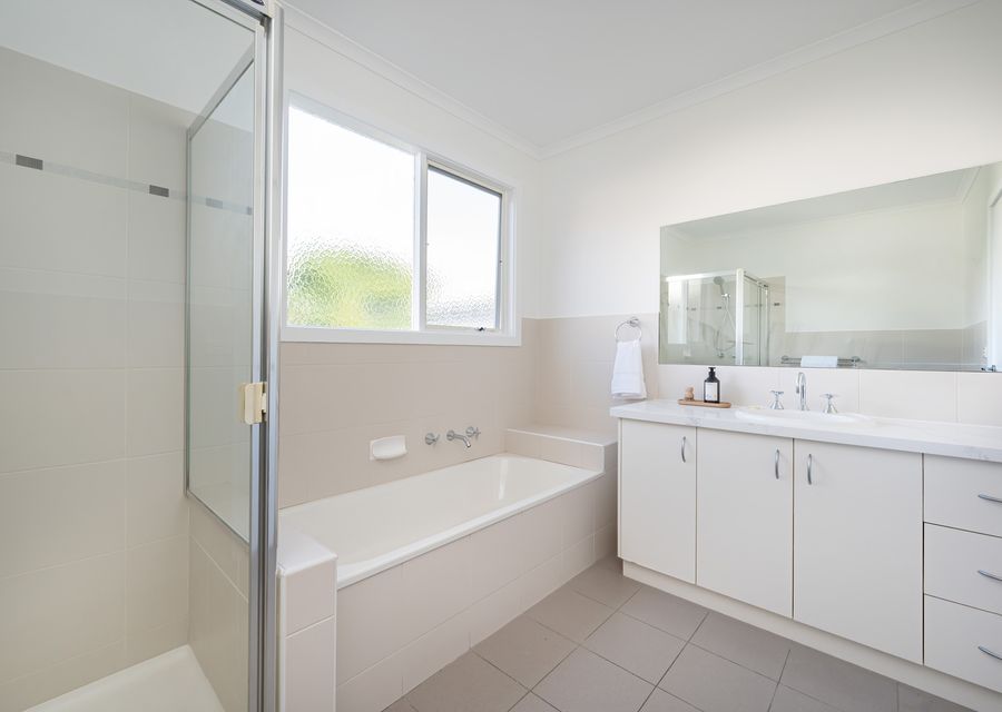 Family bathroom with bath and shower