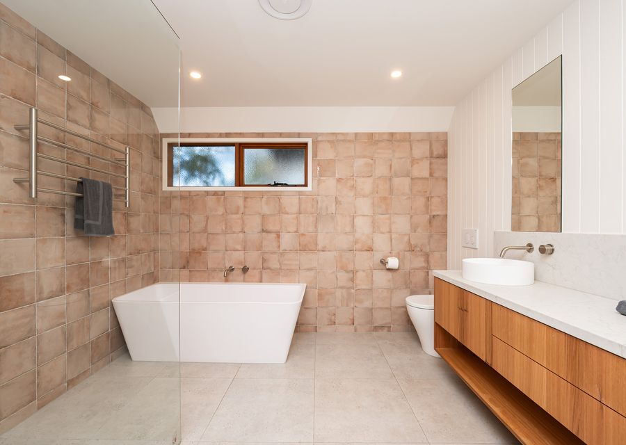 Family bathroom with bath and shower 