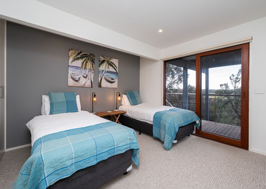 Bedroom three with two king single beds 