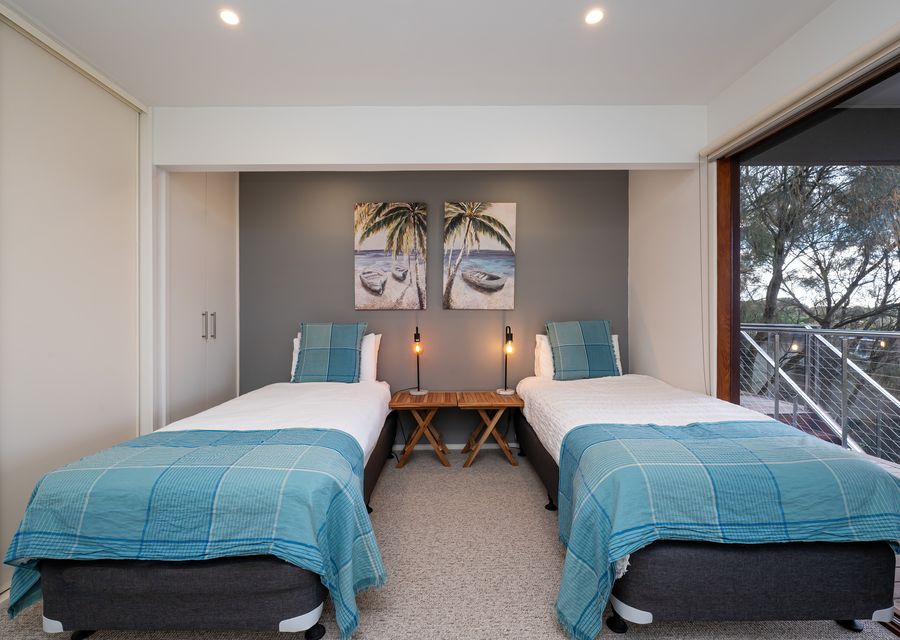 Bedroom three with two king single beds 