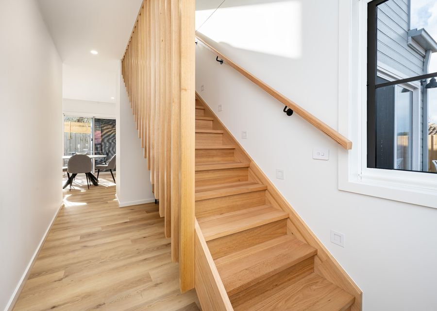 Upstairs, we have Bedroom 2, which features a Queen bed.