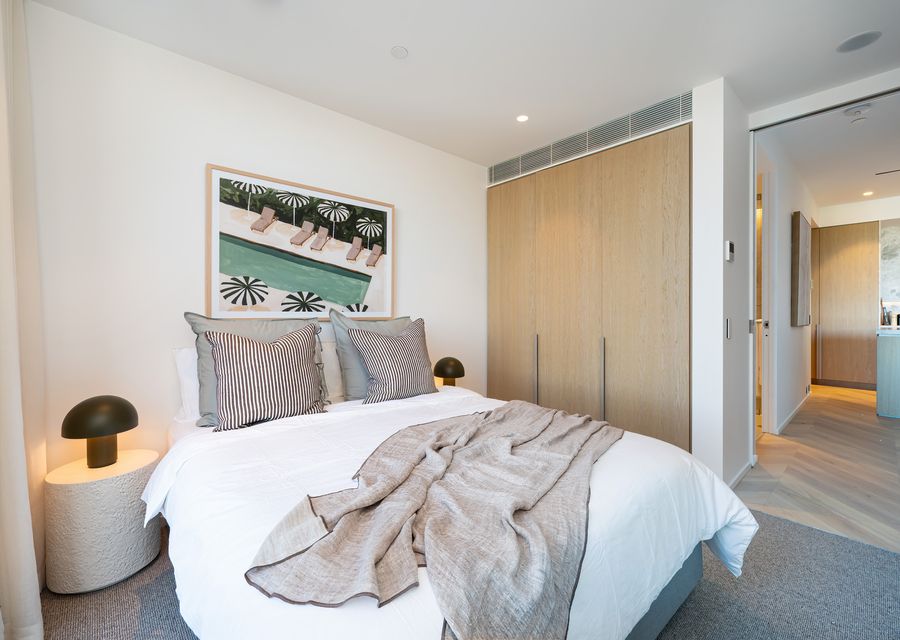 One of the two primary suits with Queen bed and ensuite