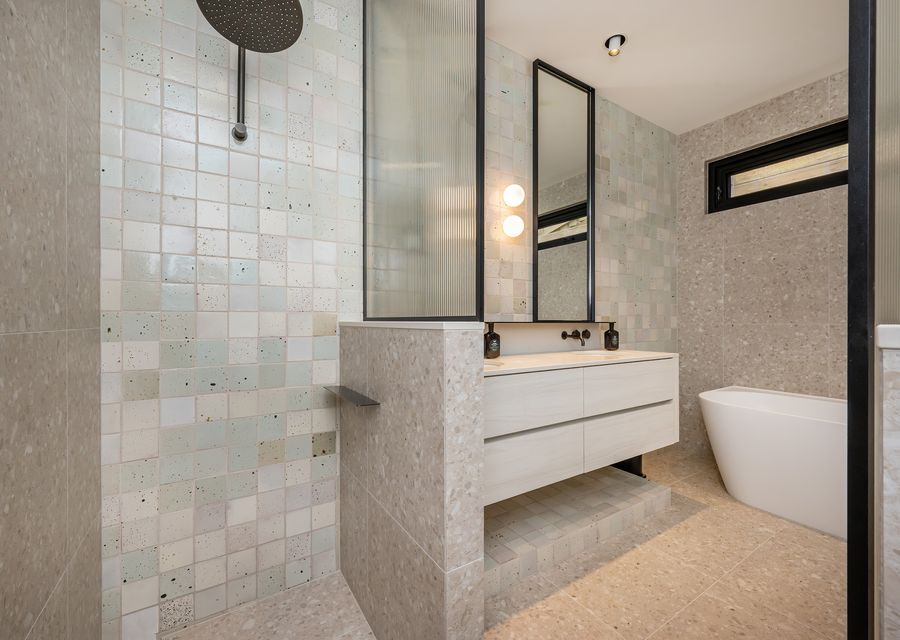 Stunning bathroom with heated floor bath and shower 