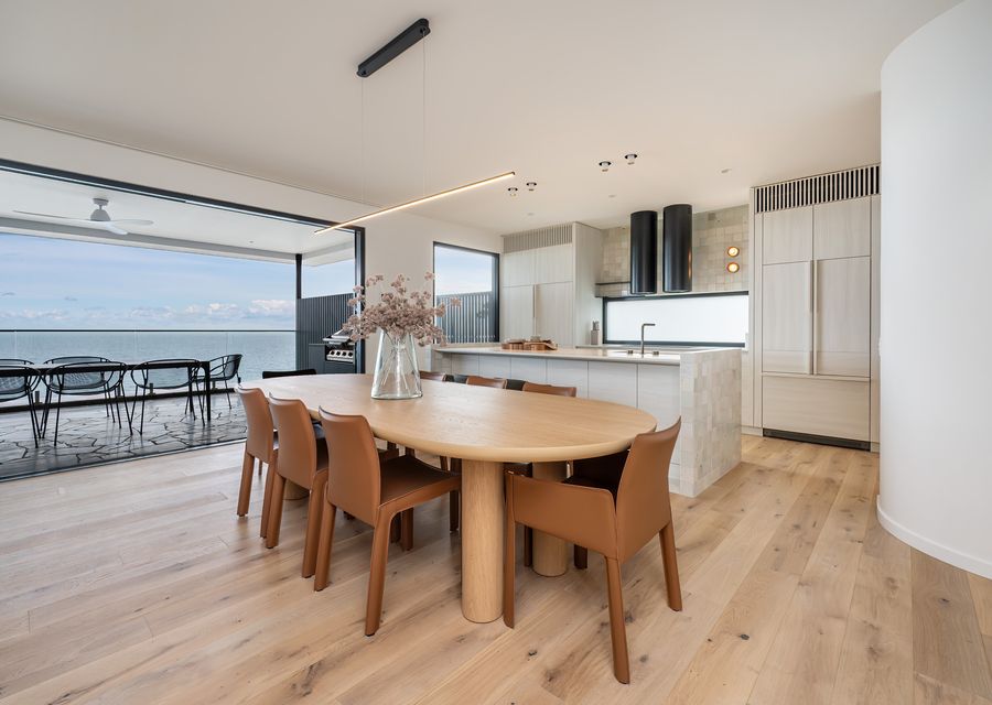 Kitchen, dining leading out to outdoor dining and bbq area. Look at that view!